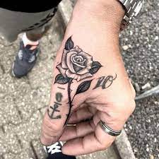 50 Simple Tiny Small Rose Tattoo Ideas For Women Latest Fashion Trends For Women Flowertattoos Hand Tattoos For Guys Small Rose Tattoo Rose Hand Tattoo