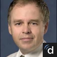 Dr. Justin K. Scheer, MD