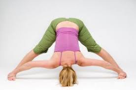 How To Do Wide Legged Standing Forward Fold In Yoga Yoga Poses Mommy Workout Physical Fitness