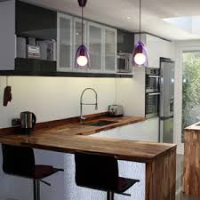 This one fits nicely at the back of this narrow kitchen and is the perfect spot for a glass of wine beside the window. Creating A Kitchen Breakfast Bar Using Solid Wood Countertops Worktop Express Information Guides
