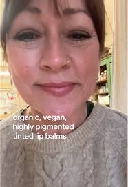 Demonstrating our new organic, vegan tinted lip balms