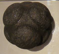The early ancestors of humans deliberately made stones into spheres 1.4  million years ago, a study said on Wednesday, though what prehistoric  people used the balls for remains a mystery.