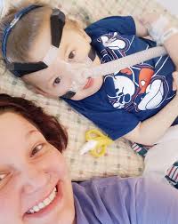 Caregiver supports partner with mobility issues