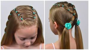Pick up a 2 inch section of hair from the very top of her ponytail and section it away with a sectioning clip. Easy Everyday Hairstyle With Pigtails And Elastics Easy Little Girl Hairstyles For Girl Little Girl Hairstyles Easy Little Girl Hairstyles Everyday Hairstyles