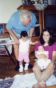 File Baby Learning To Walk Held By Old Man Leaning Over Jpg Wikimedia Commons