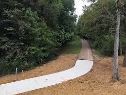 It also offers a covered bridge, chapel, old schoolhouse, large lakeside picnic area and fishing for children and seniors ($1.50 fee). Greenway Guide Huntsville Outdoors
