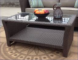 A patio coffee table is a great addition to a sectional, sofa or loveseat living space for resting items on or displaying seasonal ornaments. Sanibel Outdoor Wicker Coffee Table With Glass Top Via Wicker Paradise Outdoor Wicker Table B Wicker Coffee Table Rattan Coffee Table Wicker Dining Tables