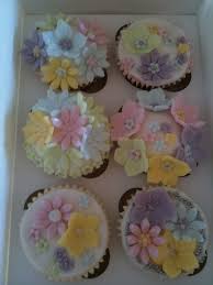 So you want to fondant a cake, but you've heard it's too difficult? Pastel Coloured Flower Cupcakes Cake Blog