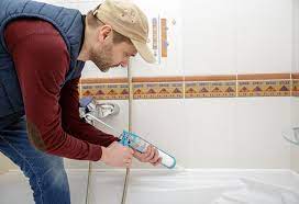 Caulking around your tub is a relatively simple process, but after the job is done, a full bathtub will tend to pull away from the wall or tiles due to the added weight. How To Caulk A Bathtub