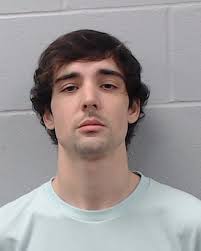 Martinez, Justin Ramon was booked into the Hays County Jail