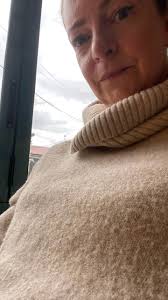 Day 14 Iin medium OC all-weather navy cardigan. It got washed with jeans, 