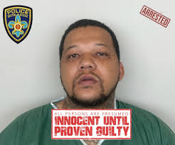 Police have arrested a suspect in the killing of an 80-year-old man sitting 