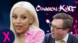Amala ratna zandile dlamini (born on october 21, 1995 in calabasas, california), better known by her stage name doja cat, is a rapper, singer, songwriter, producer and dancer. Doja Cat Explains Juicy To A Classical Music Expert Classical Kyle Capital Xtra Youtube