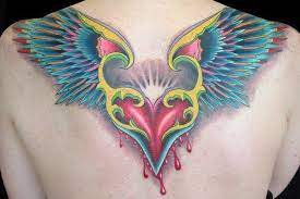 Color Tattoo Of A Flying Bleeding Heart The Wings Look A Bit Like Heart Tattoo Designs Heart With Wings Tattoo Wings Tattoo