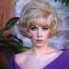 This radiant star was the leading lady in a riot of a film that turns 61  today, involving a certain quirky academic. Can you NAME THE FILM? ANSWER:  NAME OF FILM