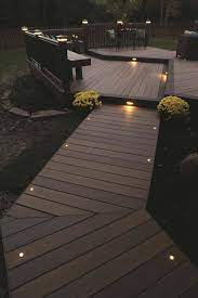 25 Creative Landscape Lighting Ideas To Give A New Look To Your Outdoor Space Backyard Patio Deck Designs Backyard Lighting