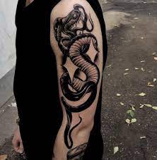 Snake tattoos represent potency and power. Old School Snake Forearm Tattoo Elegant Arts Tattoo