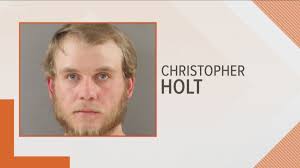 Man charged with taking pictures up woman's dress