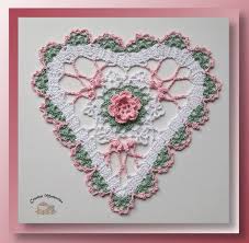 Crochet heart patterns are always a popular choice at valentine's day. Bruges Lace Heart Doily Free Crochet Valentine Doily Pattern