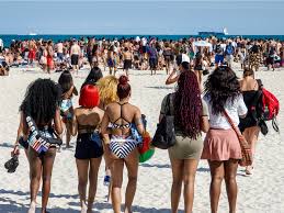 Beach chairs with umbrellas on beach. Photos Coronavirus Shuts Down Miami Beaches For Spring Break
