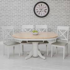 The slim marble effect ceramic top is supported by a durable fibre glass tulip style base. Ohio 4 6 Person Round Extending Dining Table Oak Effect All Dining Collections Meubles