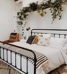 Black Bed With A Row Of Plants Home Bedroom Bedroom Design Bedroom Inspirations