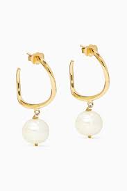 Shop Joanna Laura Constantine Gold Feminine Waves Pearl Hoop Earrings In 18kt Gold Plated Brass For Women Ounass Ua Pearl Hoop Earrings Pearl Hoops 18kt Gold