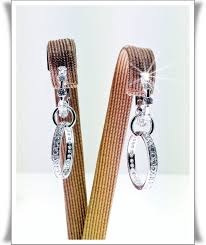 doble pendiente aro en oro blanco y diamantes