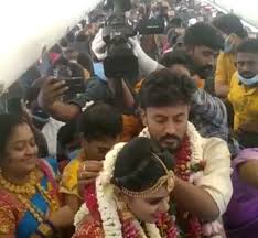 Effective march 15, 2021, new york will allow wedding receptions with up to 150 people, with a few restrictions. Indian Couple Holds Mid Air Wedding To Escape Covid Restrictions Bbc News