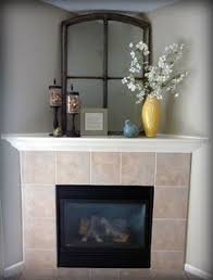 Pin By Sarah Kuhns On For The Home In 2021 Corner Fireplace Makeover Corner Fireplace Decor Corner Mantle Decor