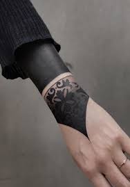 These Striking Solid Black Tattoos Will Make You Want To Go All In In 2020 Solid Black Tattoo Black Tattoos Finger Tattoo Designs