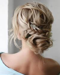 Relaxed messy updo with loose bun and bangs for long hair. 20 Easy And Perfect Updo Hairstyles For Weddings Elegantweddinginvites Com Blog