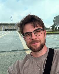 Nathaniel Buzolic added a new photo —...