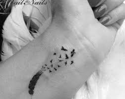 feather temporary tattoo feather tattoo boho temporary etsy in 2020 feather tattoo tattoos boho temporary tattoos