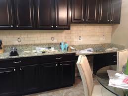 A black concrete countertop holds up to daily wear on the prep area. Diy Kitchen Backsplash Frills Drills