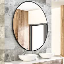 This multifunctional decor works well in any space including entryways, bathrooms, and hallways. Round Wall Mirror With Black Metal Frame Decorative Vanity Makeup Mirror Bathroom Wall Mounted Mirror