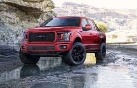 Straight lines and angles remain all the way to the expensive limited trim, so the general look is constant — it's just a matter of how much leather and wood (if any) cover up the common plastics. Here S A Look At Some Of The Ford Mustangs And F 150s Headed To Sema
