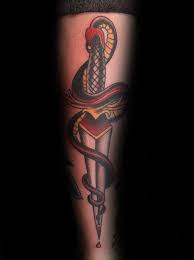 Here is a white ink snake tattoo design that looks great on hand. 100 Killer Dagger Tattoos With Meanings And Ideas Body Art Guru