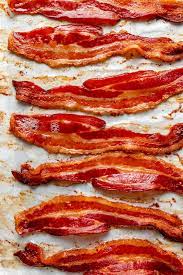 How To Cook Bacon In The Oven Perfect Every Time Ambitious Kitchen Recipe In 2021 Bacon In The Oven Bacon Recipes Using Bacon