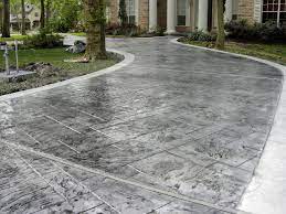 All of the pavers were placed on 4 thick 4000 psi concrete and grouted like real brick. Decorative Concrete Driveway Allied Siding And Windows