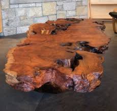 Teak root coffee table would make for a beautiful conversation starter in your rising barn rustic furniture design tree stump wood disc eucalyptus jpg driftwood natural building blog log slab how to build tos diy trunk shaped clam s me gardens decor decorating tables you ll love 2021 visualhunt. Tree Stump Table Base Options D I Y Rustic Wood Coffee Tables