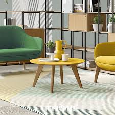 Light cozy room with bookshelves and books and coffee on table. Ilk Coffee Table My Resource Library