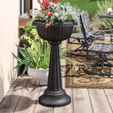 Constructed of durable cast iron, this roman urn features a hardened powder coated finish for years of beauty. Urn Planter Optional Color Finishes Display Pedestal For Outdoor Garden Statue Plant Stands Garden Decor