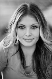 To enhance the wolf's appearance while maintaining a sharp background,  consider the following adjustments: 1. **Contrast Adjustment**: Increase the