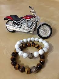 Bilegin Gucu Yureginizin Gucuyle Anlamlidir Havlit Ve Kaplan Gozu Taslari Gumus Topuzlar Ile Daha Da Guc Kazaniyor Guc Ve Zeraf Gumus Harley Davidson Mavi