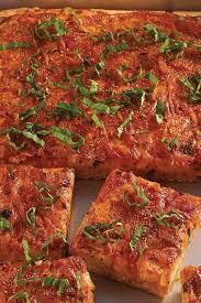 Sicilian Style Pizza In Sicily A Generous Almost Focaccia Like Crust Is Commonly Topped With An Abunda Sicilian Recipes Sicilian Style Pizza Sicilian Pizza