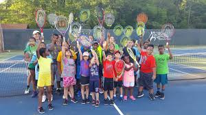 Tennis camp in Dayton teaches kids a new sport