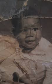 Can someone help make this old photo clearer?