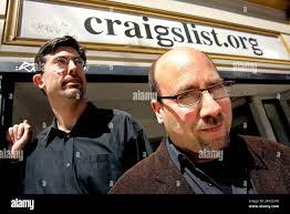 FILE ** In this April 14, 2005 file photo, Craigslist.org CEO Jim  Buckmaster, left, and founder Craig Newmark, center, are photographed  outside of their office in San Francisco. Craigslist countersued its