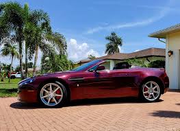Image result for Amethyst Red 2011 Aston Martin